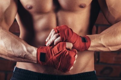 MMA Fighter with red hand wraps