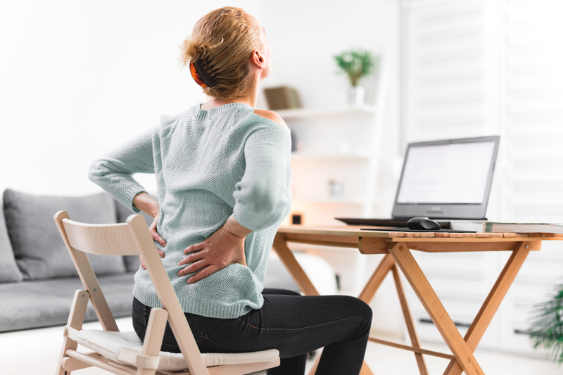 Woman,Working,On,A,Laptop,And,Having,Back,,Hip,,Spine